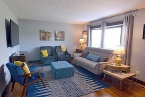 Living Room

Blue ottoman pulls out into twin size bed