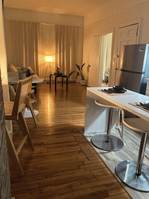 Looking out from main bedroom in the kitchen and liivingroom. Desk space 