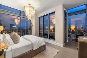 Primary suite with a king bed and a 55" 4K UHD TV