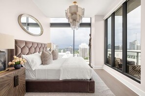 Primary suite with a king bed and a 55" 4K UHD TV