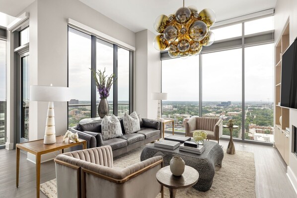 Living room featuring a 65" 4K UHD TV