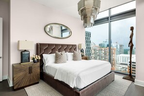 Primary suite with a king bed and a 55" 4K UHD TV