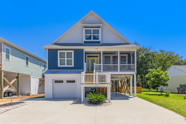 Welcome to Myles's Sandbox! Enjoy a charming beach getaway with modern amenities, spacious outdoor areas, and easy access to the shore.