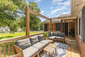 Enjoy the warm Charlotte nights from the comfortable outdoor porch