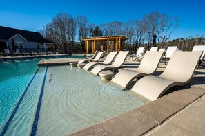 Shared Amenity: Escape to our retreat where sun-soaked days and refreshing dips await you.