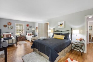 Large room with several beds