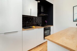 Kitchenette with an oven.