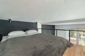 Living area with mezzanine.