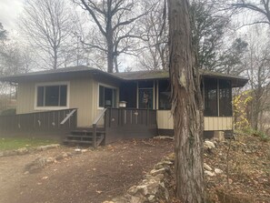 Main entrance through the screened porch