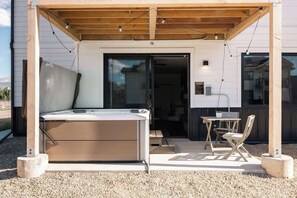 Hot tub and seating on the patio