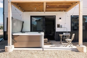 Hot tub and seating on the patio