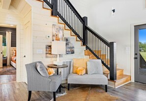This welcoming entryway sets the tone for your stay. With its cozy seating and open design, you’ll feel right at home as soon as you walk in.