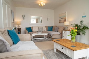 Sitting room with corner sofa and coffee table