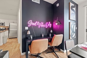 Good Vibes Only is our motto! Boost your productivity in this stylish work nook. With comfortable seating and a modern desk, it's the perfect space to catch up on work or plan your next adventure.