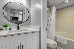 Start your day right with a full bathroom equipped for all your prepping needs.