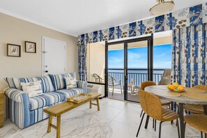 Relax in the comfortable living area, perfect for lounging after a day at the beach.