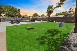 Backyard with Pool, Hot-tub, and games