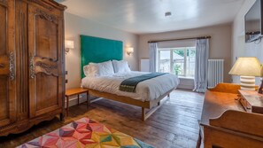 Bedroom one's colourful design makes the first floor unique