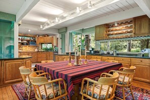 A spacious kitchen and large dining table for 8 allows for your group to dine in style during your stay.