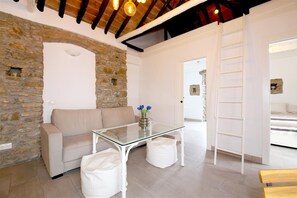 Comfortable seating up to three guests in the lounge area
