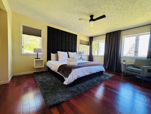 Beautiful main floor  Master Bedroom with King Bed!  Windows give great sunlight