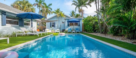 Soak up the sun in this private tropical oasis—featuring a sparkling pool, plush loungers with umbrellas, and vibrant greenery all around. The perfect setting for a refreshing drink, a good book, or pure relaxation.