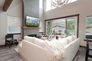 Main Living and Dining Spaces (TV, Deck and Gas Fireplace)