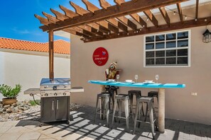 Outdoor bar area by the pool