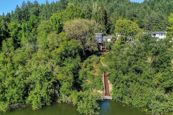 The Treehouse, riverfront cabin on a 3-unit property.