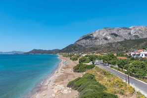 Votsalakia Beach, with its pebbly shores, is just a 10-minute drive away