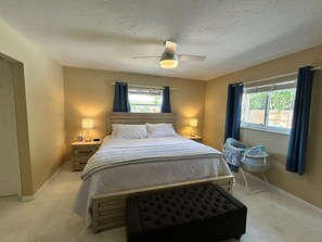 Master bedroom has king bed,bassinet,TV,walk-in closet,ceiling fan,ensuite bath.