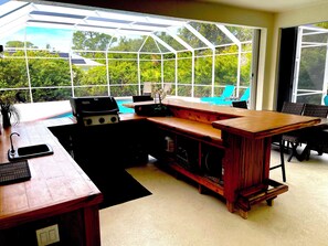 Gas grill, TV, full bar. Perfect for your family get together!