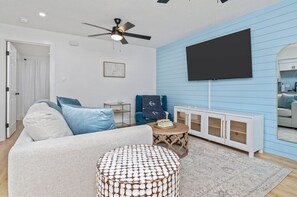 Enjoy quality time with your loved ones in this living room, equipped with a sofa bed and smart TV