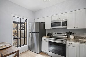 Natural sunlight and a 4-burner cooktop to prepare your meals
