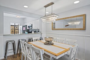Dining seats 8 + 4 high top stools