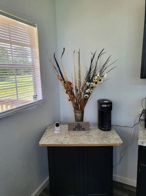Coffee maker,dishes, and pots are provided