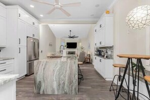 Prepare your beautiful meals in this custom luxurious kitchen with so much space