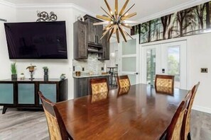 Gather around the dining table. Share a wonderful meal or have a fun game night.