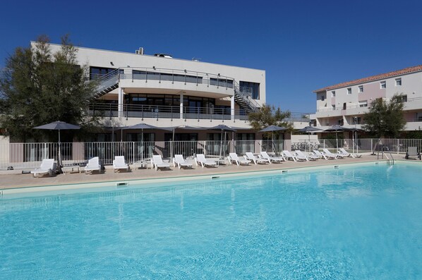Get some sun in the outdoor pool.