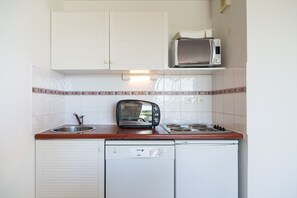Prepare a small meal in your kitchenette.