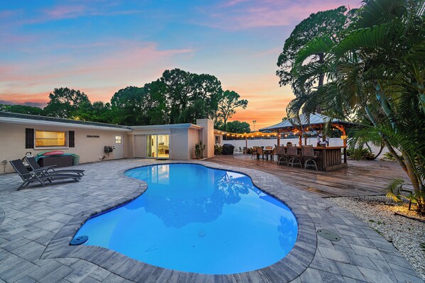 Welcome to Tiki Tide Villa - A private oasis with a STUNNING outdoor space!