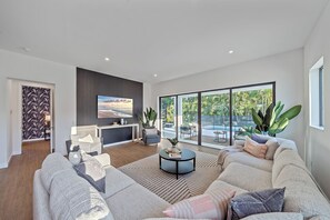 We LOVE this spacious and bright living room!