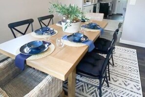 Dining room with large table seats up to 6.