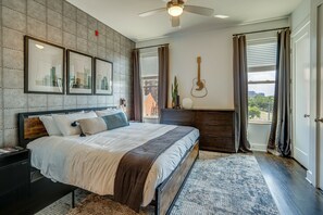 Unit 2: Master bedroom with King size bed, designer furnishings and flat screen TV.