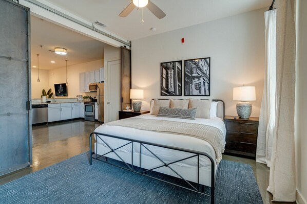 Unit 1: Spacious Primary bedroom with King bed, smart TV and en-suite bathroom.
