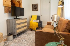 Living room with smart TV; includes Netflix