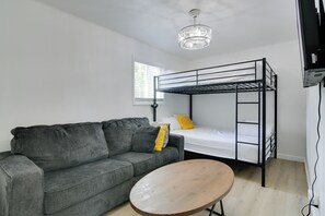 Living Room | Flat-Screen TV | Queen Bunk Bed | Free WiFi