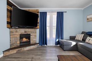 Gas Fireplace and huge fancy tv with Disney Plus and Amazon Prime