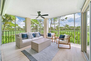 BonBay1 - This corner unit has a spacious screened in balcony which overlooks the Bonita Bay golf course