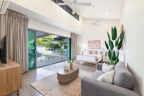 The pool house studio opens up directly to the pool area.